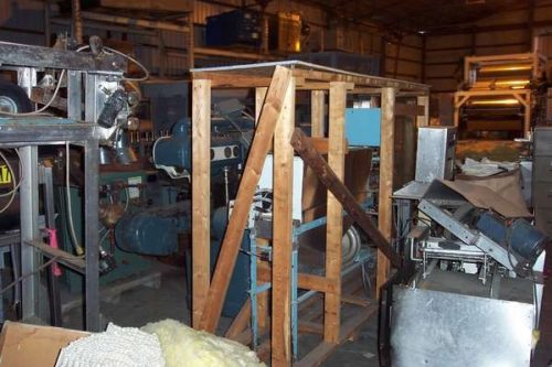 VERTICAL BELT DRIVEN ROTARY CAP FEEDER